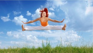 Confidence in being yourself - girl doing the splits midair