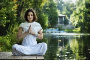 Girl meditating solemnly